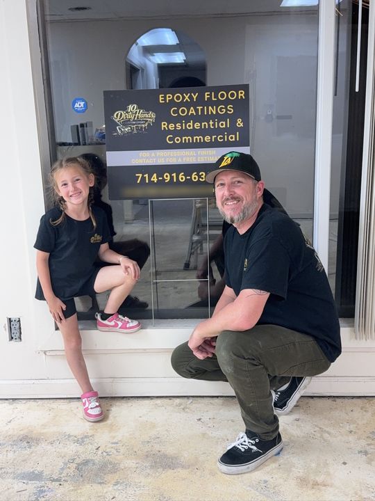 Brian Newton, owner of 10 Dirty Hands Custom Epoxy, outside a job with the company yard sign