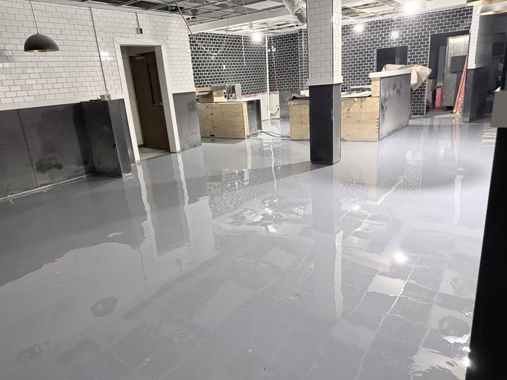 High-gloss gray coating in a commercial kitchen