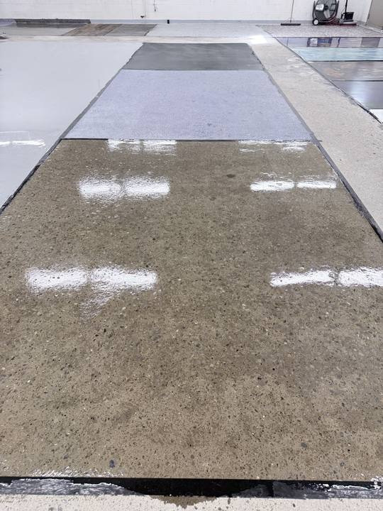 Long glossy concrete floor