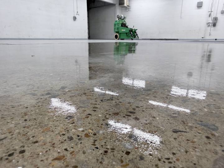 Glossy finished concrete floor with exposed aggregate