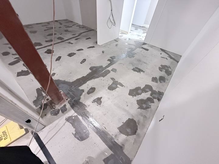 Room with cracks and holes filled before coating